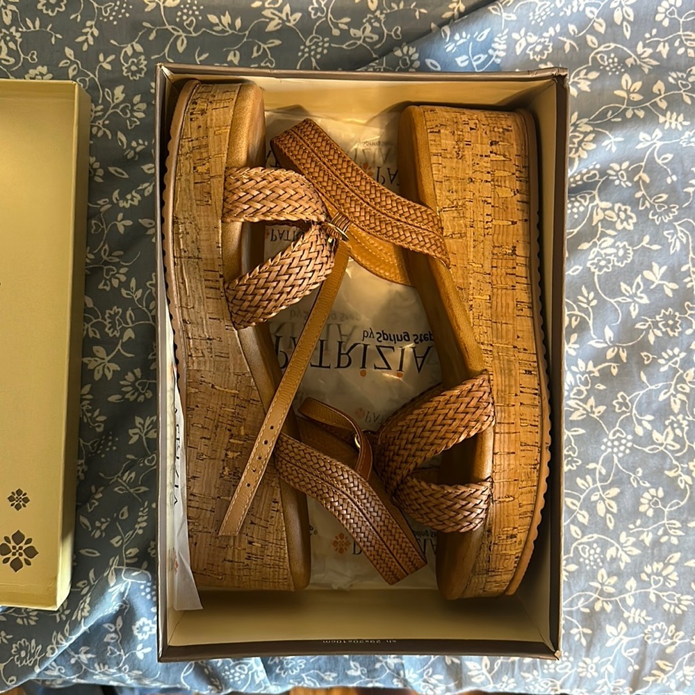 Size 11 Patrizia wedge heel. Only worn once!